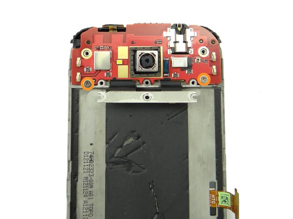 Replace two 2.7 mm #00 Phillips screws from SLOT 6.