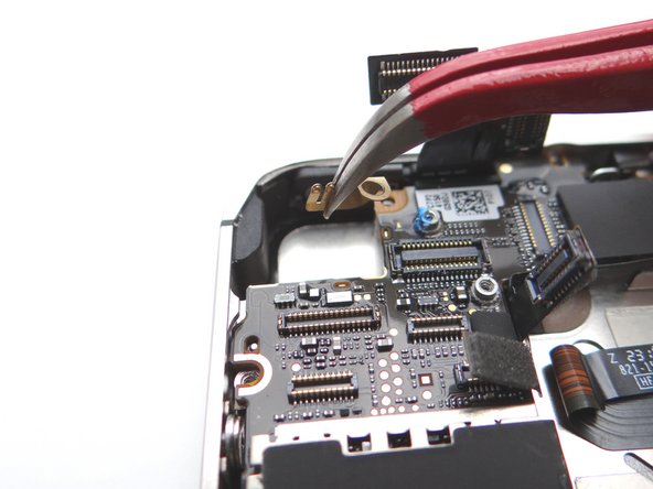 Picture 3: Remove Gold Grounding Clip with Curved Tip Tweezers. Place clip in SLOT 8 with Phillips screw.