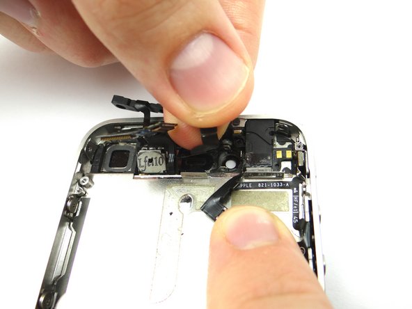 Picture 1: Realign and secure the ribbon cable down with your fingers.