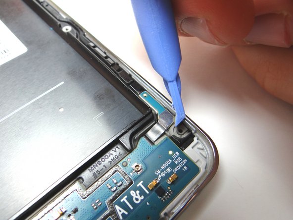 Disconnect the charging port connector.