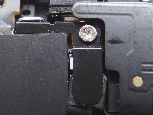 Remove Antenna Shield: Older iPhones are held in place with a Standoff Screw and will NOT have a Phillips screw on top.