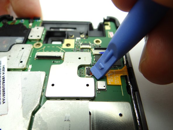 Picture 1: Open the buttons cable ZIF connector.