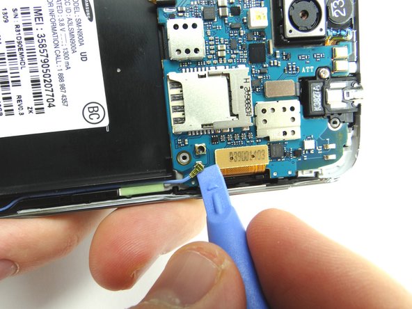 Disconnect the antenna cable using the blue pry tool as shown in Picture 2.