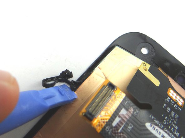If you're reusing the screen: use the blue pry tool and your fingers to peel up the adhesive covering the perimeter of the underside of the screen.