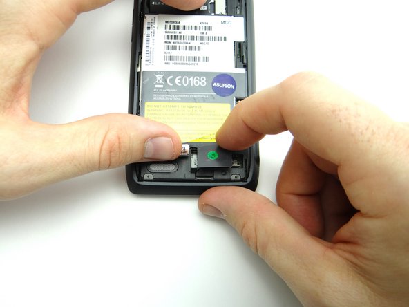 Picture 3: Fold the IMEI Sticker sticker flap back over the battery connector.