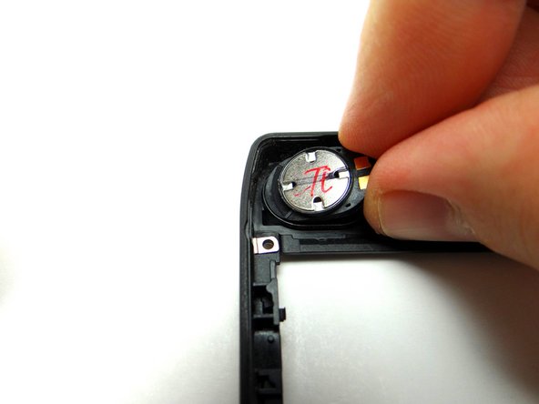 Seat it in the mid-frame as shown.