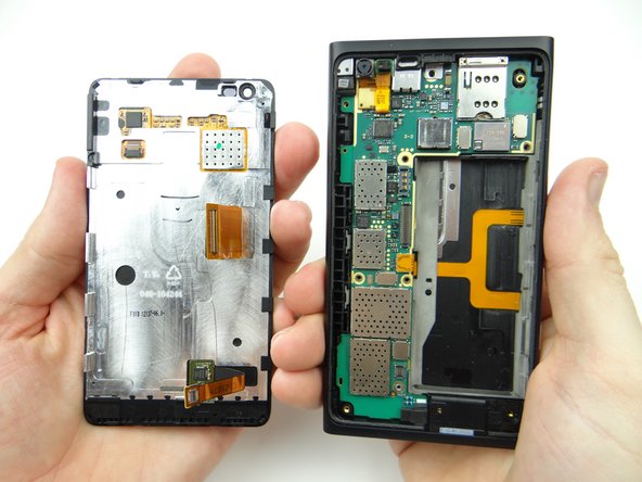 Place display assembly and rear panel on the anti-static foam.