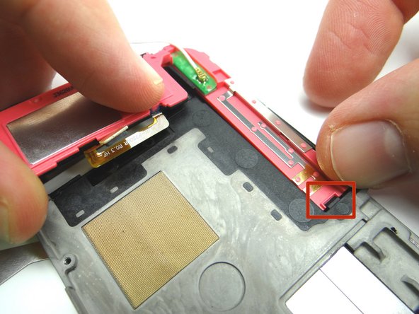 Seat under ledge (red square) then push into place.