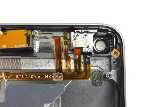 Picture 3: Remove one 1.6 mm #00 Phillips screw.  Place screw in SLOT 9.