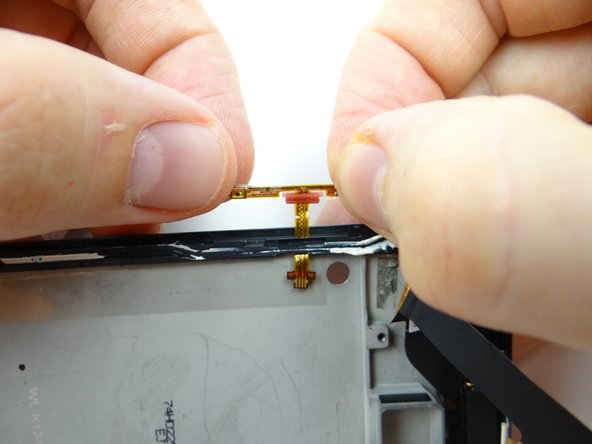 Feed the cable through the slot on the mid-frame, then seat it as shown in Picture 3.