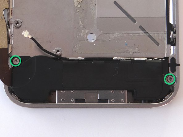 Picture 1: Remove the two 2.4 mm Phillips screws from the sides of the loudspeaker assembly. Place in COMPARTMENT E.