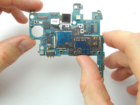 Use your fingers to brush away any ribbon cables while you remove the logic board. Place into ZONE III.