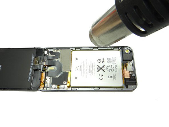 Picture 1: Apply low-level heat in 30 second increments as needed to loosen the battery adhesive.