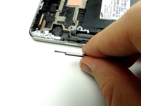 Remove the power button and place it in COMPARTMENT F.