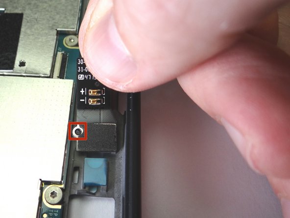 Line up with opening on the cable with the tab on the rear case (red square).