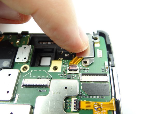 Pictures 1 &amp; 2: Hold down headphone jack cover while replacing two 3.6 mm T5 Torx screws from SLOT 2.