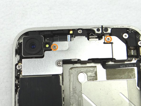 Picture 1: Replace the two 1.6 mm Phillips screws from SLOT 5.