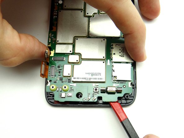 The LCD is held to the logic board with mild adhesive: