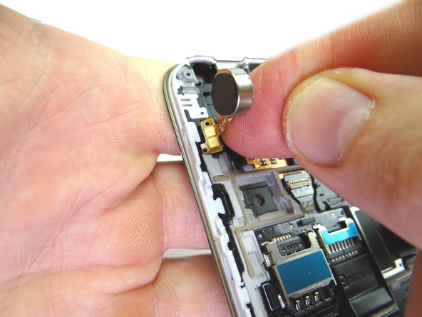 Picture 3: Place vibrator in COMPARTMENT D.