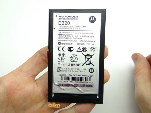 Place the battery on top of the battery cover in ZONE I.