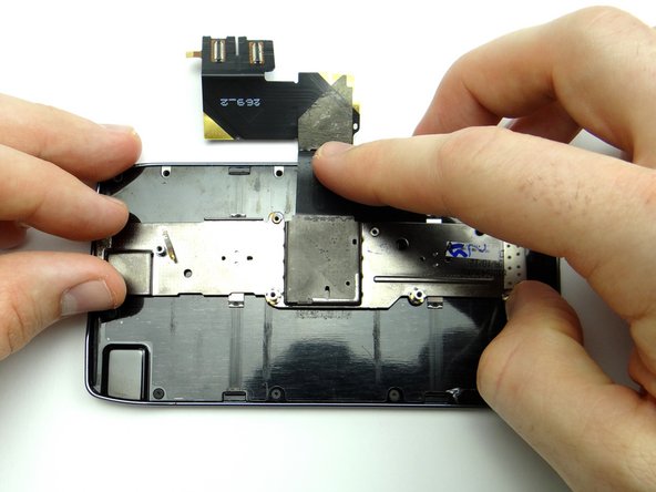 Picture 2: Fold display cable down while moving sliding bracket on top of cable.