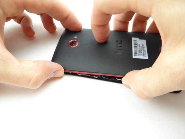 Continue pushing into place, but leave the bottom edge up.