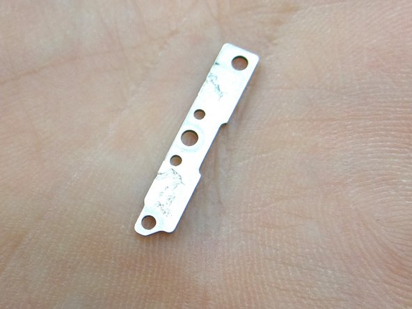 Picture 2: Place metal bracket into ZONE V.