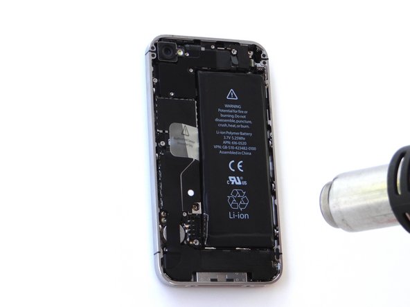 Apply low-level heat (100* Celcius or less) to edges of battery for 60 seconds to loosen the adhesive securing the battery to the iPhone.