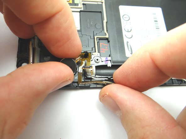 Grab the vibrator from COMPARTMENT D.