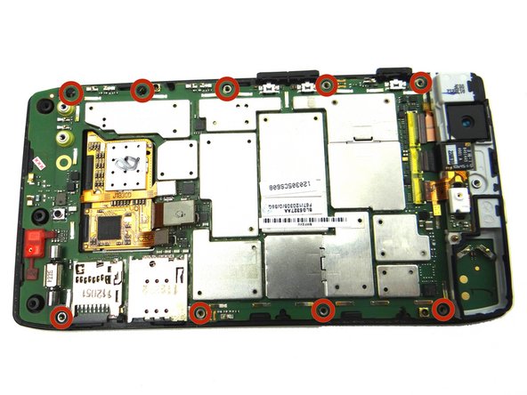 Picture 3: You should see nine silver or gold standoffs poking through from the display.  Five on one side and four on the other as pictured.