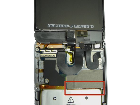 Picture 1: Make sure the tape hanging over the bottom edge of the logic board covers the top edge of the battery. (The device won't close properly otherwise).