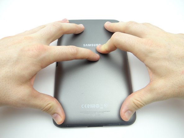 Picture 2: Continue pushing all clips into place.