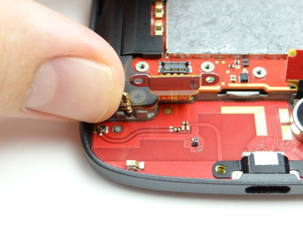 Pictures 2 &amp; 3: Disconnect antenna then gently bend straight up (so it's out of the way when you remove the charging port board).