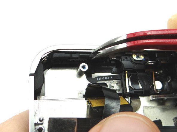 Picture 2: Use Curved Tip Tweezers to replace the power button bracket.