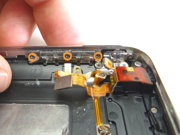 Remove three 1.4 mm screws.  Place in SLOT 14.