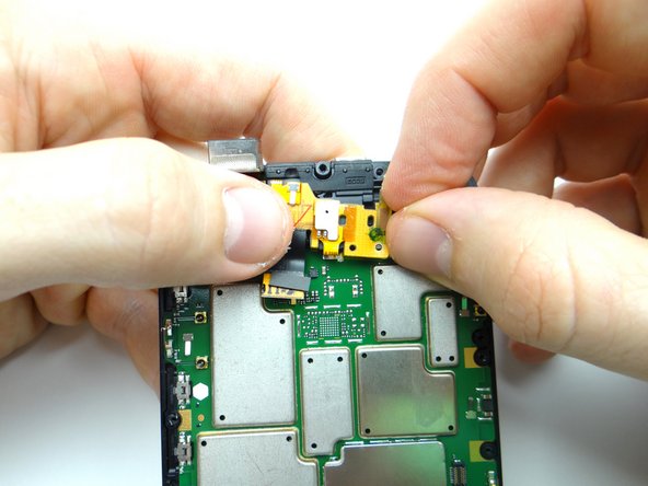 Picture 2: Slide the assembly under the tab.