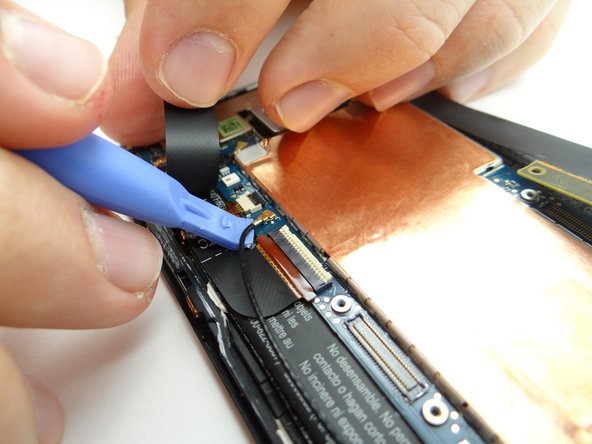 Picture 1: Peel up Kapton tape covering ZIF connectors &amp; antenna connector.