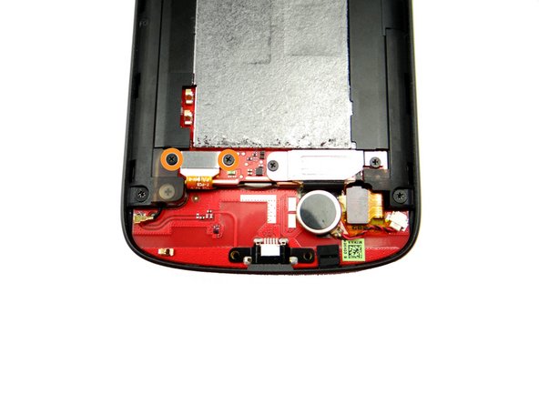 Remove two 1.7 mm #00 Phillips screws from the battery connector.  Place in SLOT 2.