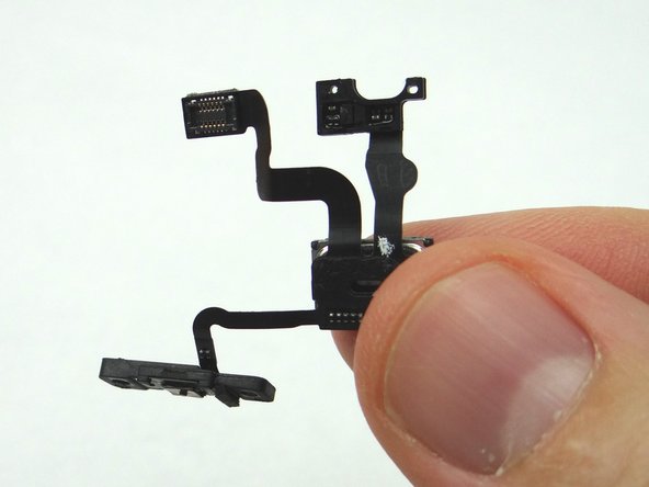 Pull the Earpiece Speaker/Power Cable Assembly free from the iPhone. Place into COMPARTMENT F.