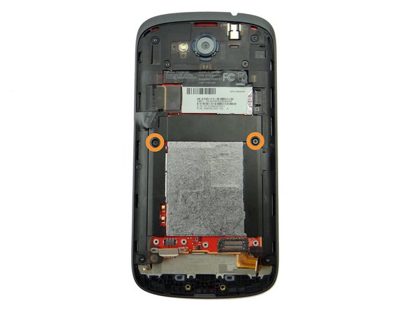 Picture 2: Remove two 1.7 mm #00 Phillips screws.  Place in SLOT 2 (with battery connector screws).