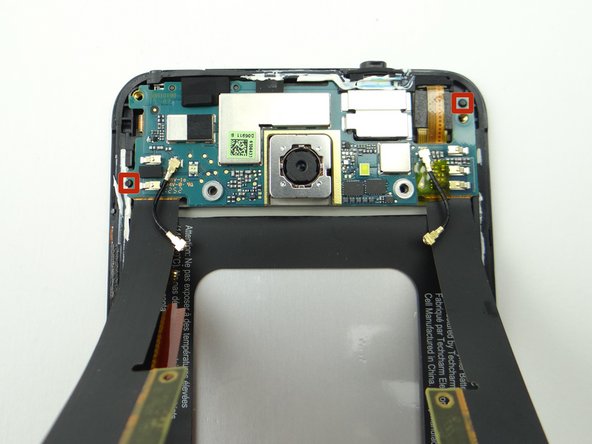 Picture 3: Line up tabs on display assembly with openings on daughter board (red squares).