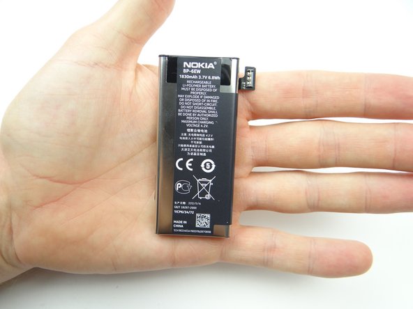 Seat the battery and connect it to the logic board.