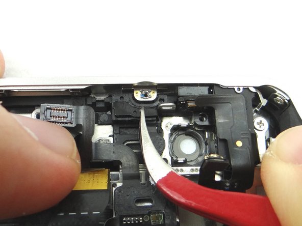 Ensure it is snapped back into place by firmly pressing down with your index finger.