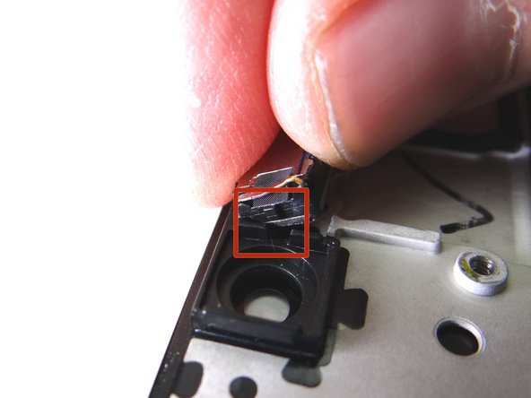 Make sure the tiny tab on the earpiece speaker lines up with the opening on the front panel.  Push speaker into place.