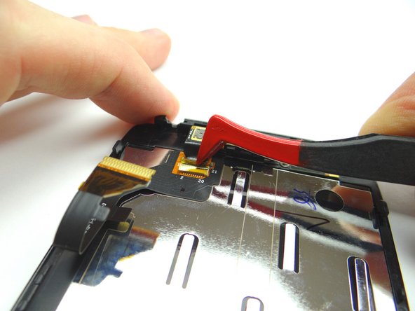 Picture 1: Remove tape with plastic tweezers.