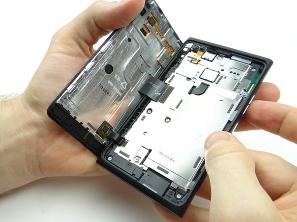 Continue lifting the screen slowly until it reaches a 90° angle.