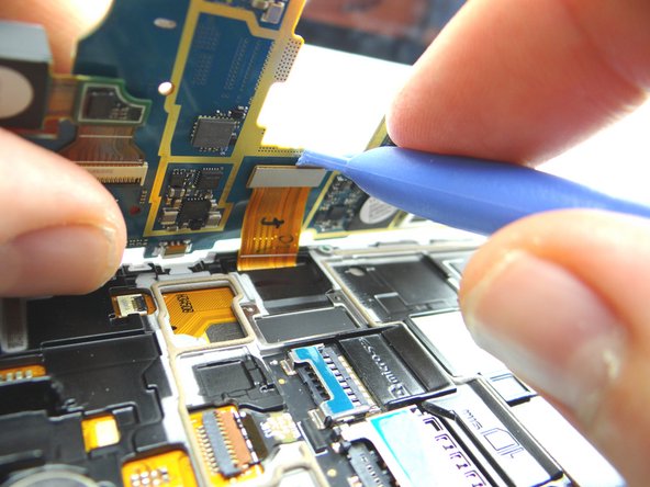 Disconnect display assembly cable.