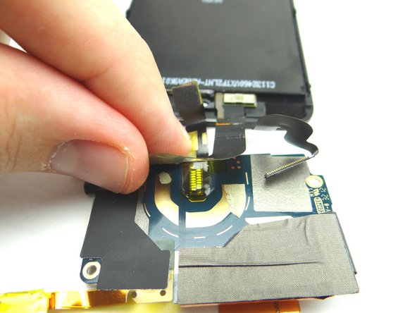 Peel up LCD cable from logic board.