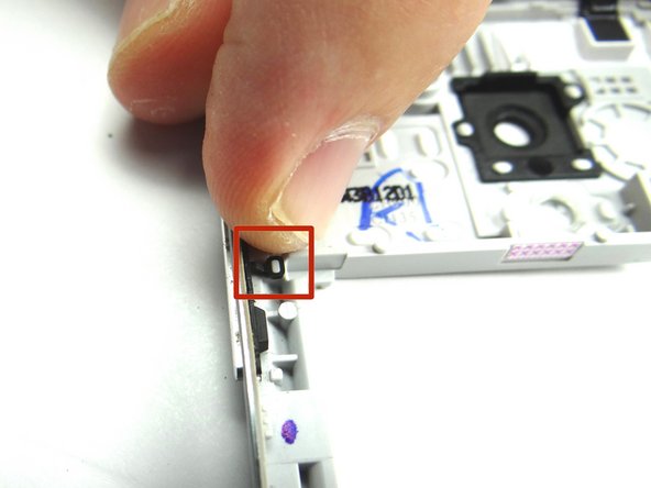 Picture 2: Seat rubber attachment head over tab as shown in red square.