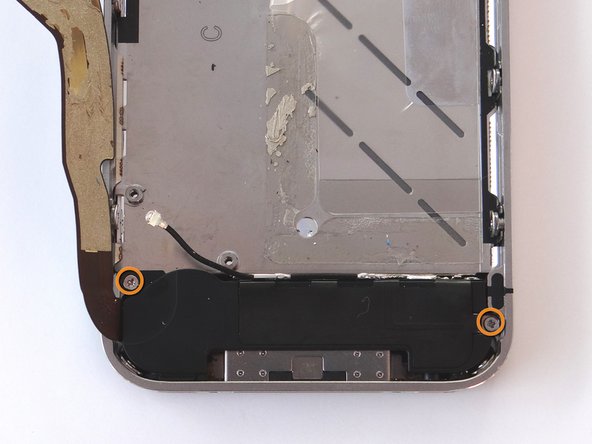 Replace the two 2.4 mm Phillips screws from the sides of the speaker enclosure assembly from SLOT 12.